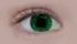 Occhio con iride di pixel verdi