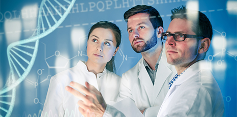 Tre ricercatori in laboratorio