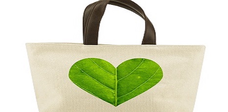 immagine di una shopper in stoffa con un cuore fatto da foglie disegnato sopra: biodegradabile;